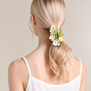Handmade lily of the valley crochet hair scrunchie in soft pastel yarn