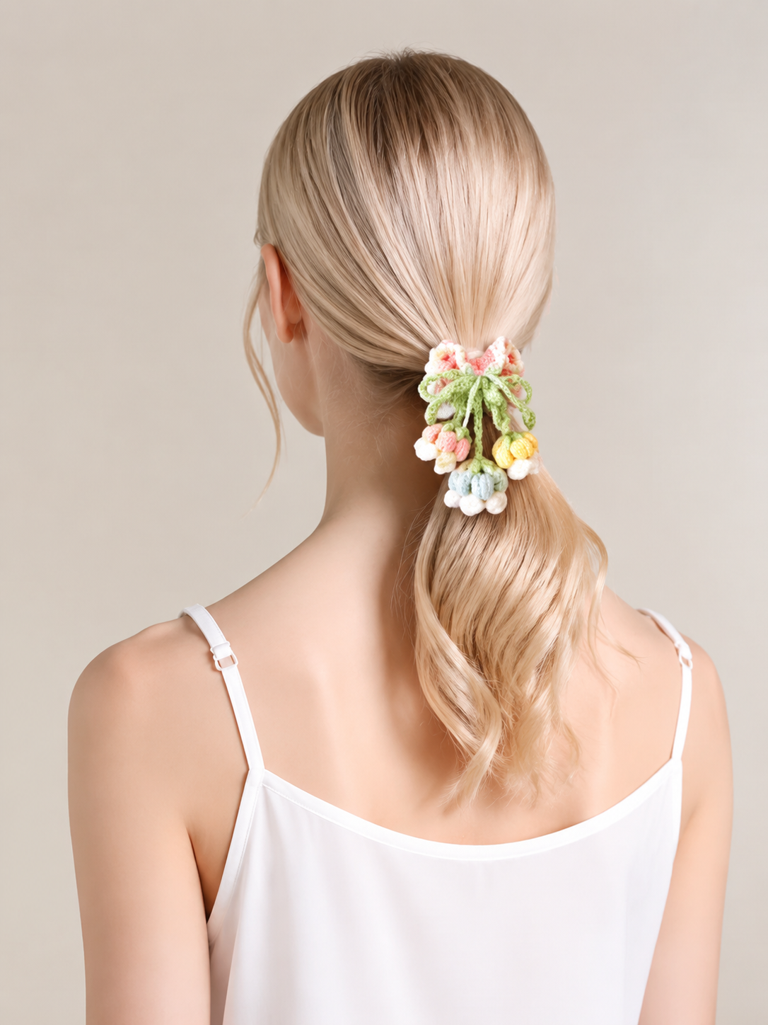 Handmade lily of the valley crochet hair scrunchie in soft pastel yarn
